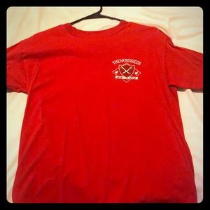 The hundreds red shirt with design on the back